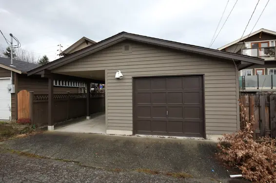 Lane access to a single garage and carport  