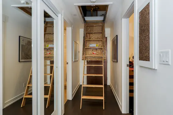 Hallway with attic storage access | 402 - 650 Evergreen Place  